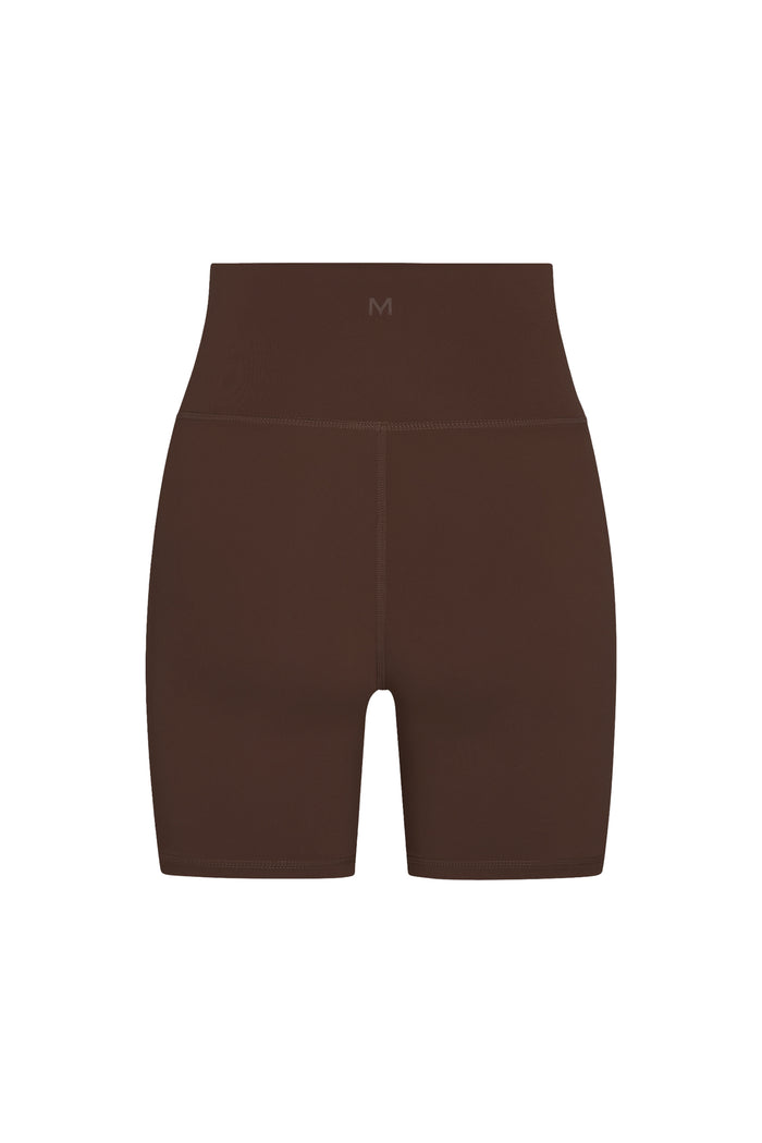 Front view of Griffith Short 6.25-inch in Espresso showing high-rise waistband, tonal M logo, center front seam on white background