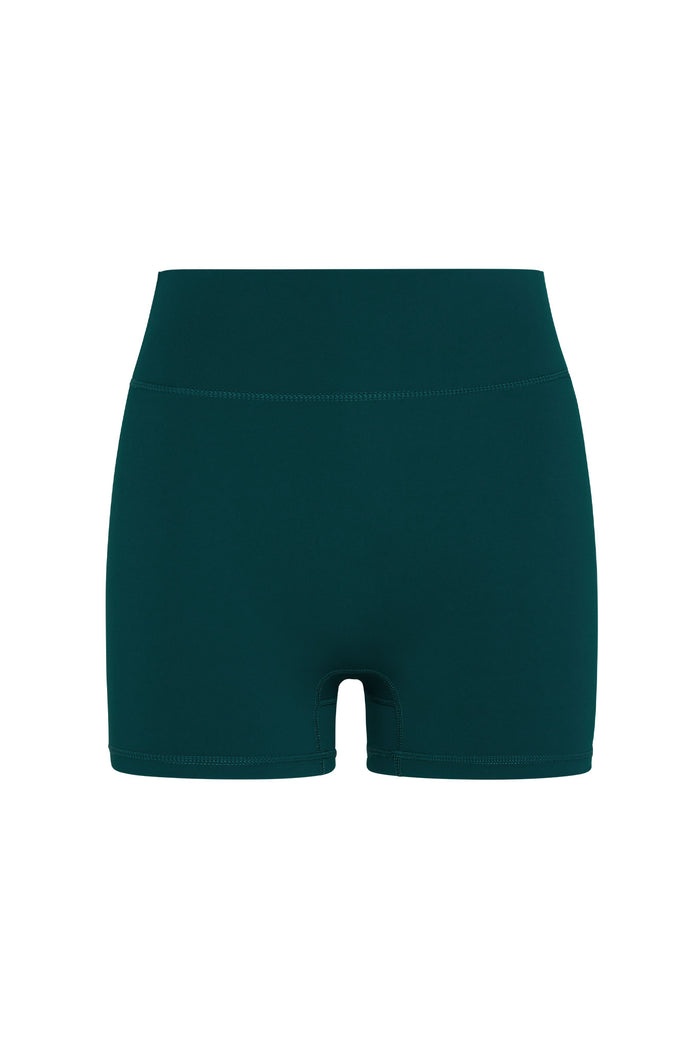 Front view of Griffith Short 6.25 in Evergreen showcasing high waist, short inseam and flat seams on white background