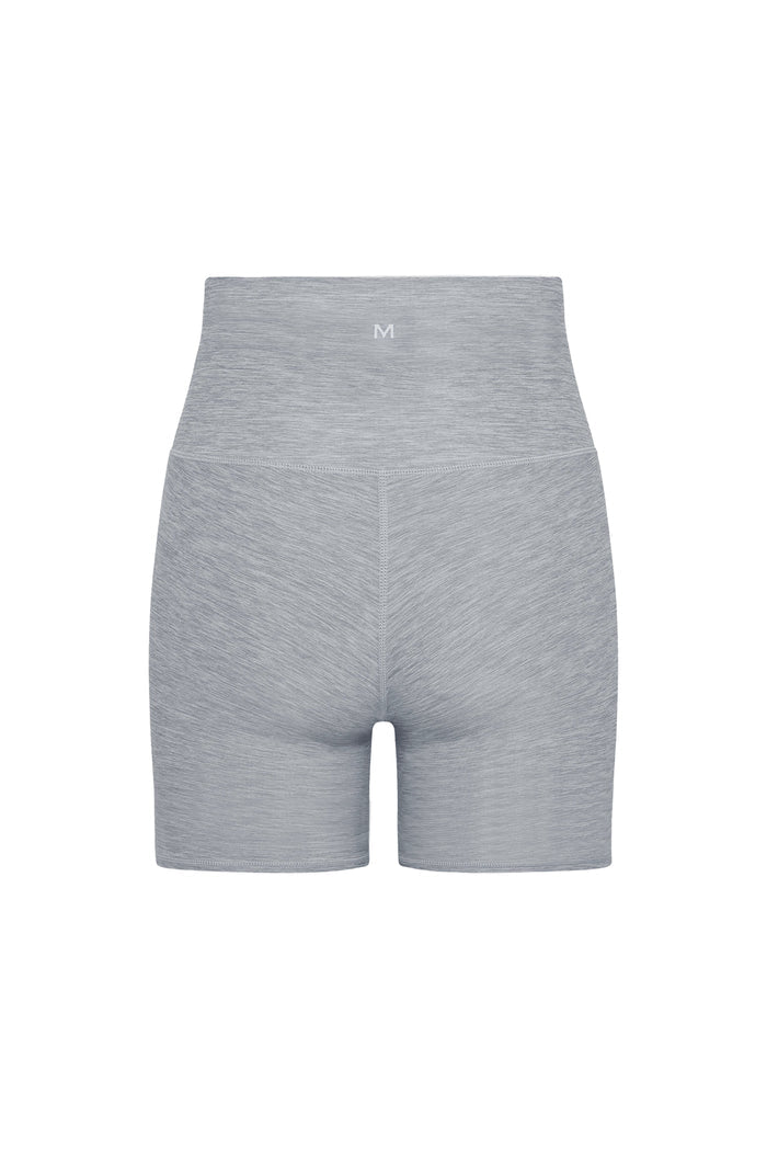 Back view of Griffith Short 6.25 inch in Heather Grey showing high-rise waistband, center logo, and flatlock seams