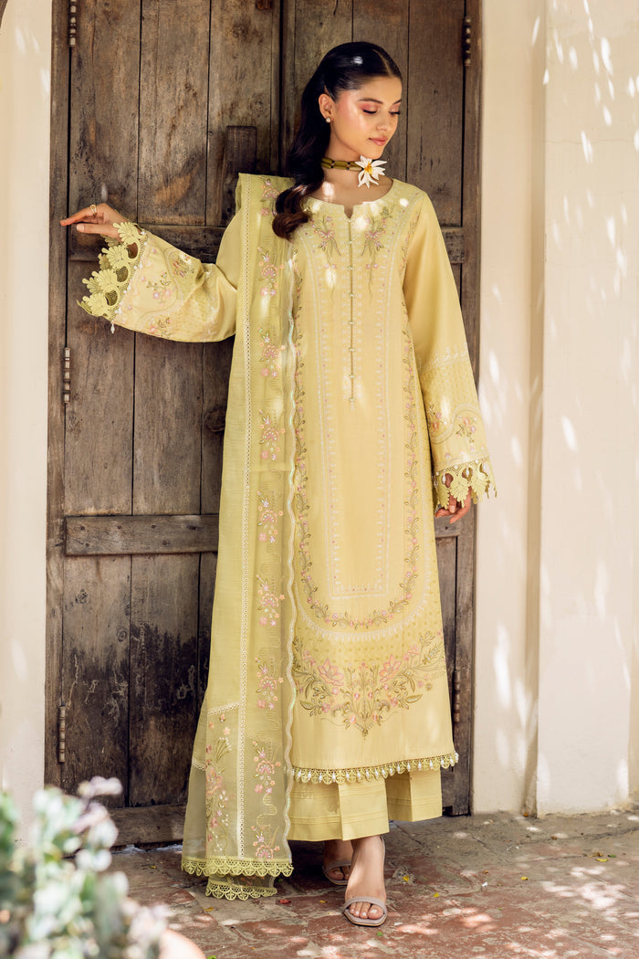 NAQSHI Gulshan front: lime‑lemon Pima lawn shirt with embroidered boat neckline framing collarbone, decorative buttons, three-panel cut & lace‑trim hem.