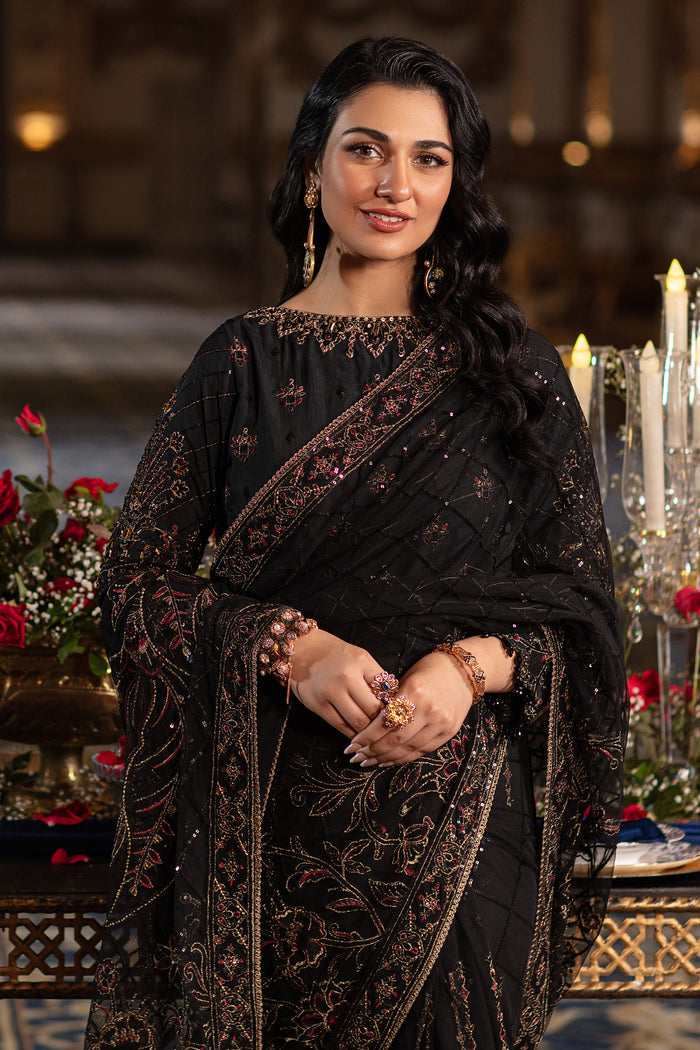 Naqshi Hainoor net saree edge detailed with lustrous thread and sequin embroidery, viscose-fused border and delicate lace finish along the hem.