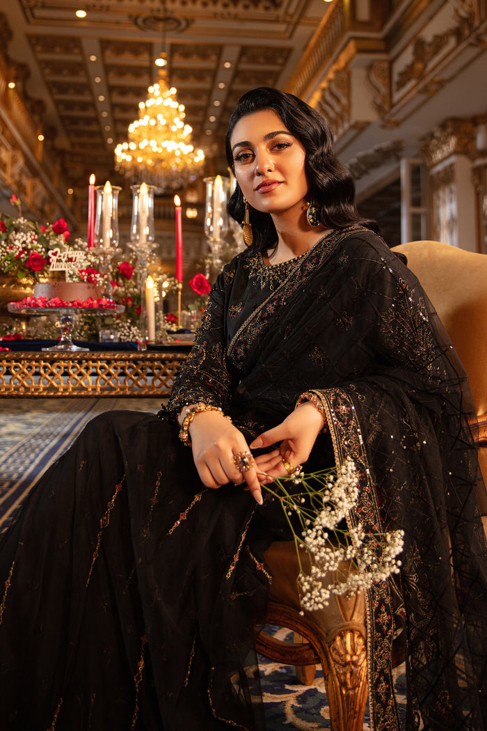 Macro capturing the texture of Hainoor’s net saree fabric alongside the blouse’s bead-sequin hangings and cutwork embroidery.