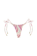 Front of Hanalei Bottom in Costa Rei Pink, minimal-coverage mid-rise with adjustable side ties and gold hardware on white