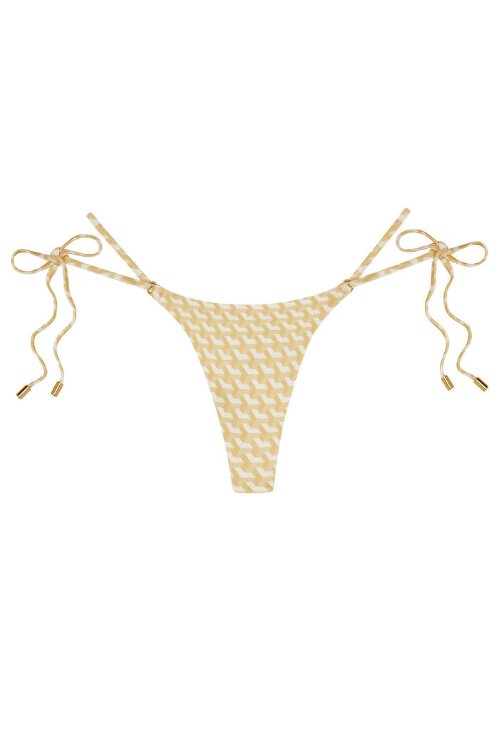 Front view of Hanalei Bottom in Ivory Geo showcasing tie-side strings with gold-tipped caps on white background