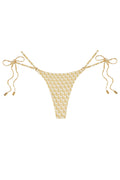 Front view of Hanalei Bottom in Ivory Geo showcasing tie-side strings with gold-tipped caps on white background