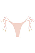 Front view of Hanalei Bottom in powder pink rib, tie sides, ribbed texture, minimal coverage, gold hardware on white