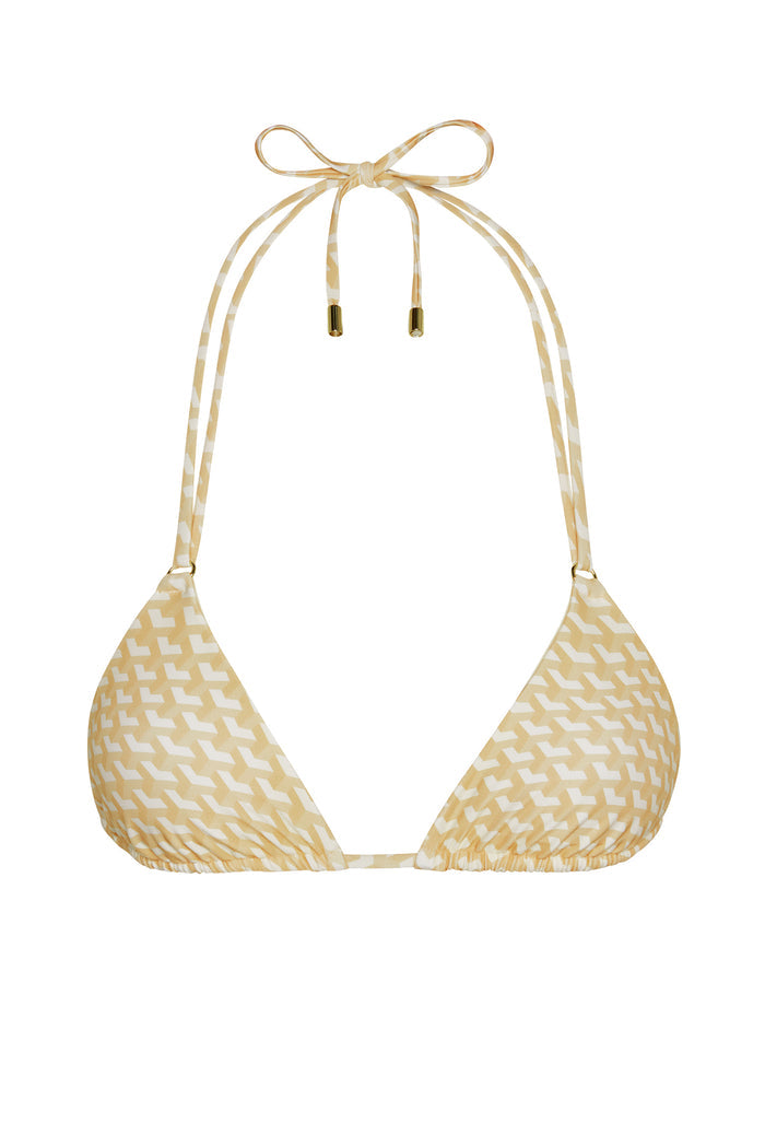 Front view of Hanalei Top in Ivory Geo showing triangle cups and thin adjustable halter tie with gold end caps on white