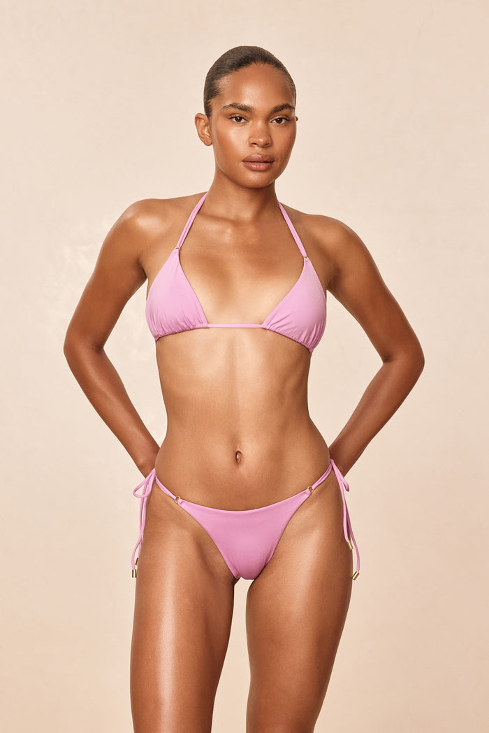 Front of Hanalei Top in Moonlight showing triangle cups, dainty gold rings, and thin adjustable halter and back ties