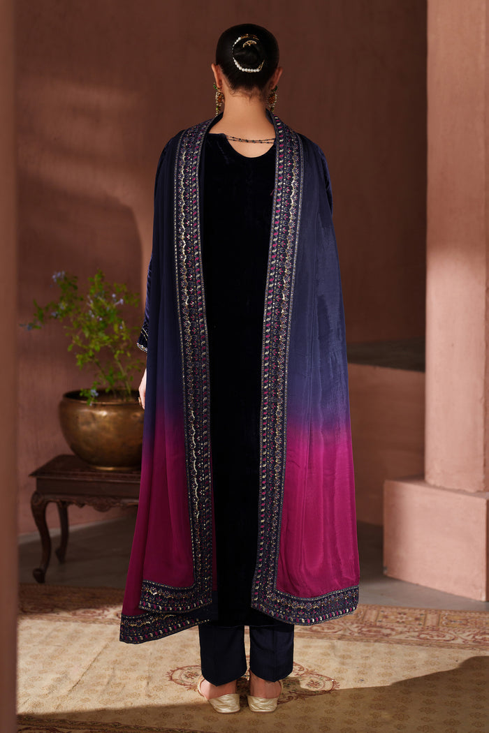 Back view of NAQSHI navy blue occasion wear dress highlighting neat stitching and fall of the long shirt