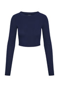 Front view of Hayworth Long Sleeve cropped top in midnight with crew neck, long sleeves and ribbed texture