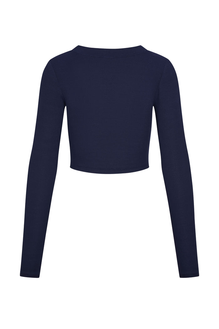 Back view of Hayworth Long Sleeve in midnight showing cropped fit, long sleeves and ribbed texture on white background