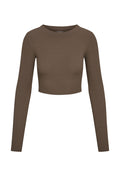 Front view of Hayworth Long Sleeve crop top showcasing lightweight ribbed fabric and cropped hem on white background