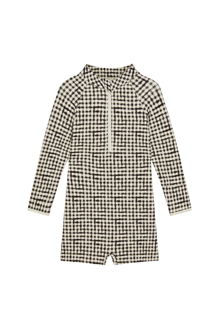 Front of Hilo One Piece Kids in black gingham showing long sleeves, center front zipper, scoop neckline on white background