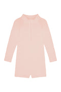 Front view of Hilo One Piece Kids in powder pink crinkle showing long sleeves and center front zipper on white background