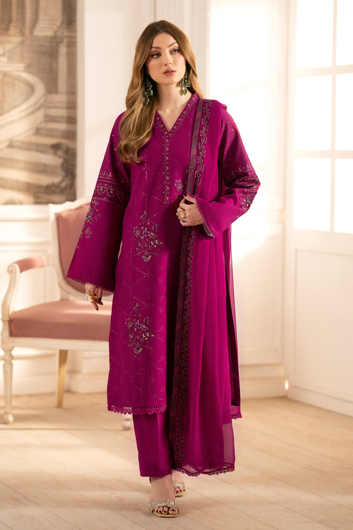Model wearing full NAQSHI Hira 3PC: rose-pink cambric shirt with beaded neckline, pleated straight trousers & embroidered crinkle dupatta