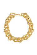 Close-up of Holbox necklace in gold showing twisted rope textured interlocking round links and box clasp on white background