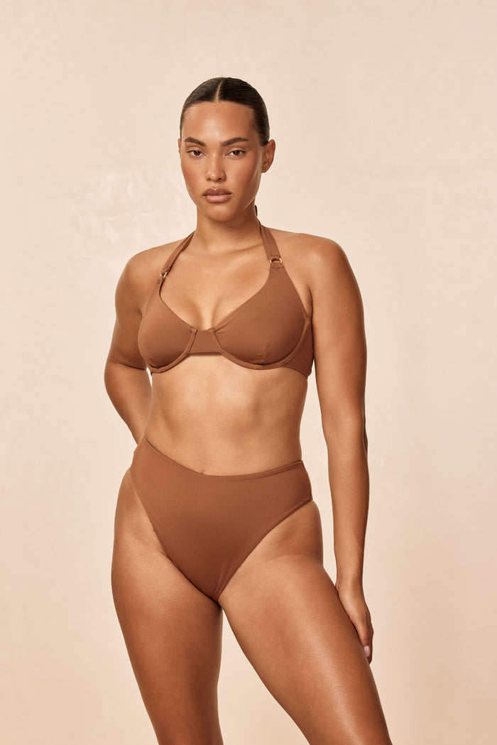 Front view of Honolulu Top in Caramel on model showcasing underwire cups and adjustable halter straps on neutral background