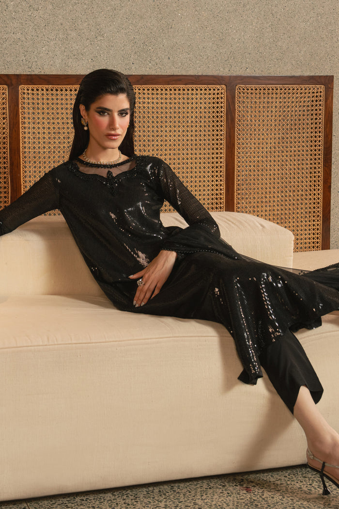 Front close view of NAQSHI Horleyn black net shirt showing near-neck detail, sequin embroidery, adda work, and refined formal finish.