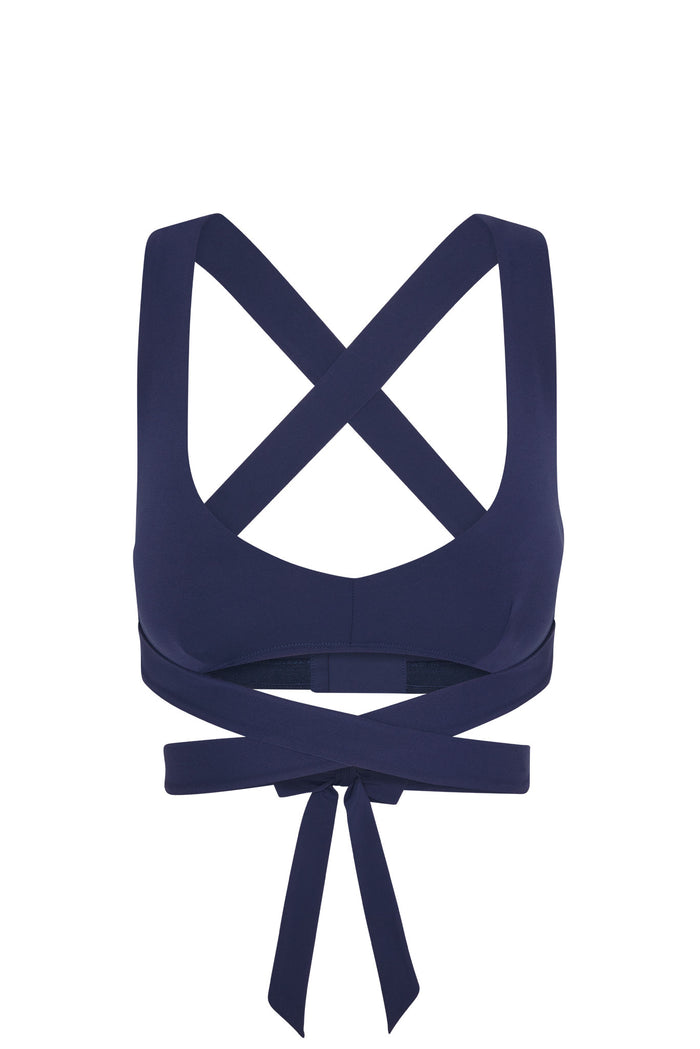 Back view of Hudson Bra in Midnight Jersey showcasing crossed straps and long wrap-around tie on white background