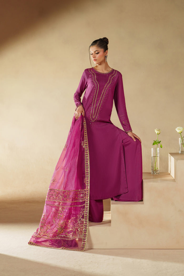 Full length view of NAQSHI Imsha magenta luxury pret set with detailed embroidery, flared raw silk culottes, and matching dupatta.