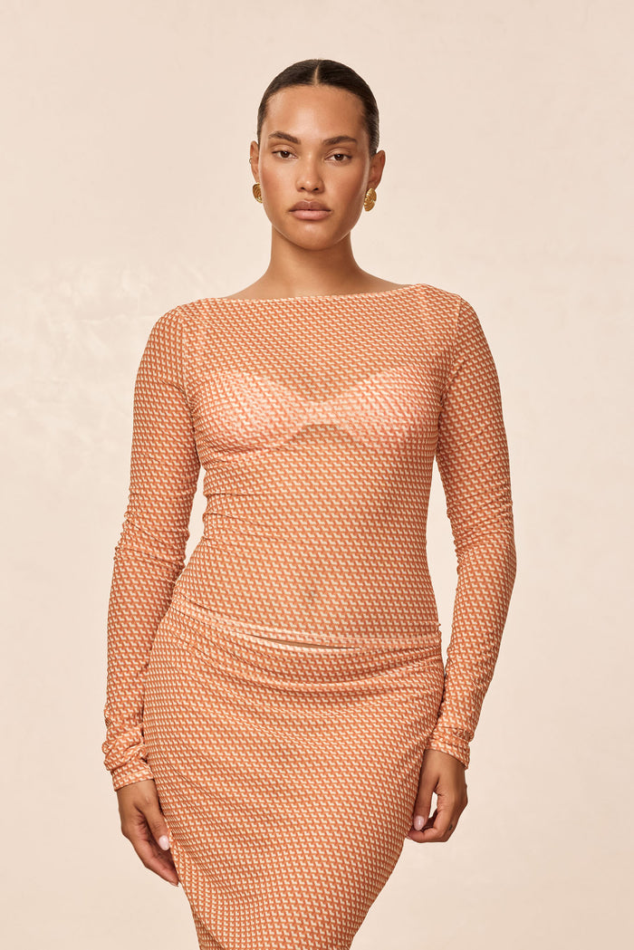 Front of Ipanema Top - Micro Geo Mesh showcasing sheer long sleeves and peach micro geo pattern on cream background