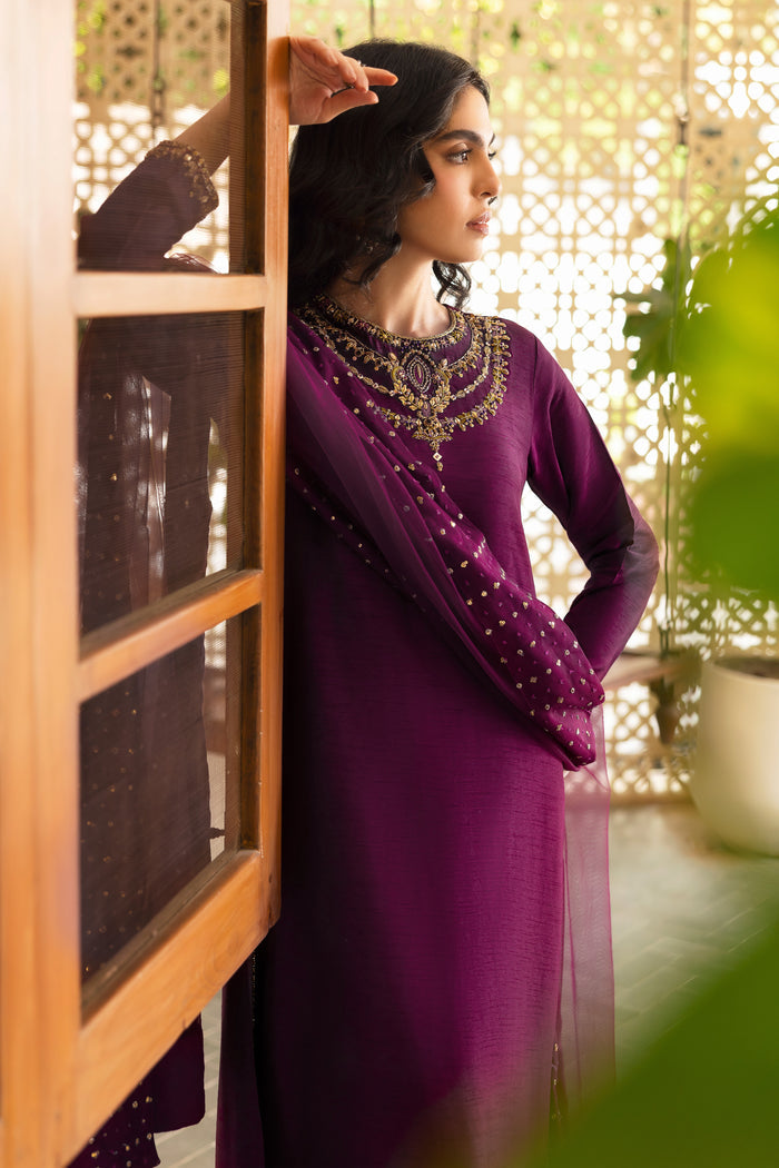 Close-up of NAQSHI Irma shirt sleeve cuff showcasing dense hand-adda embellishments and contrasting olive-green seam that aligns with culottes.