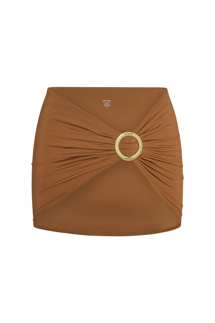 Front view of Jamaica Sarong in caramel showcasing gathered front tie with gold branded ring on white background