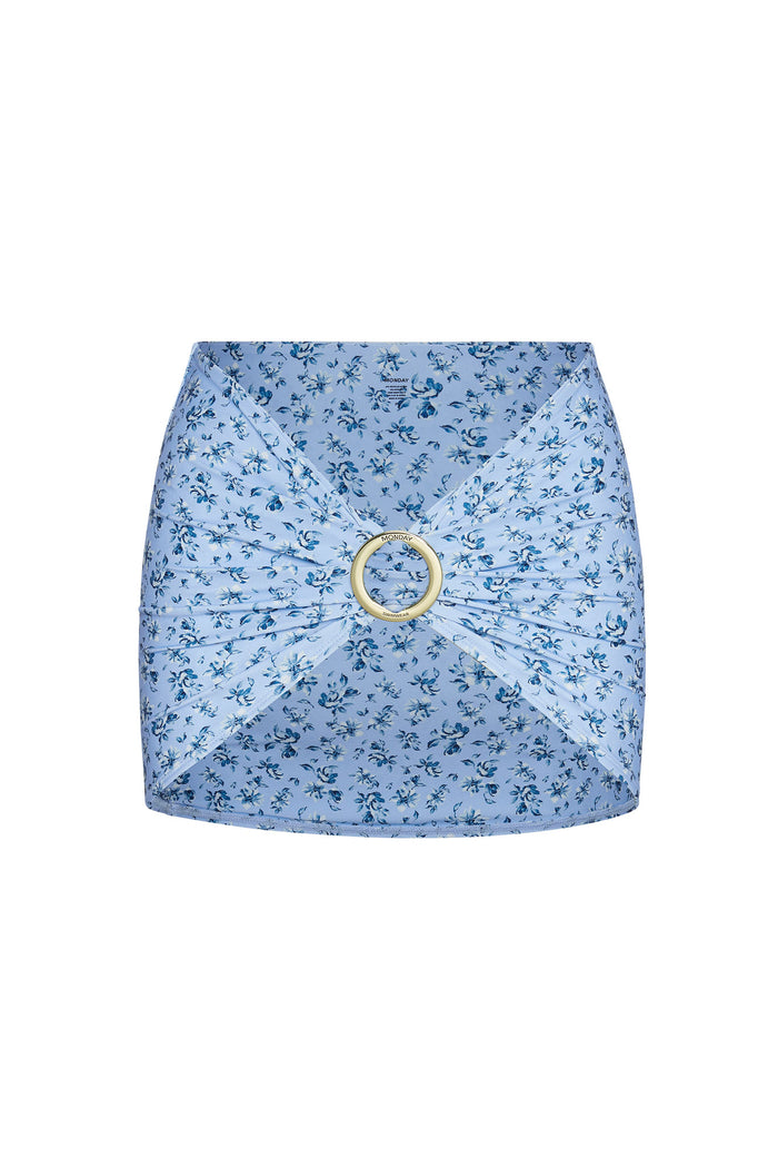 Front view of Jamaica Sarong in Isola Floral showing mini-length wrap with centered gold metal ring buckle on white
