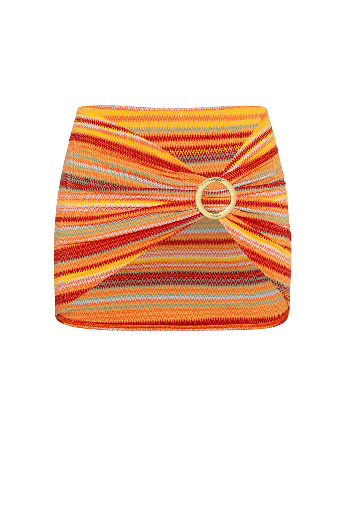 Front view of Jamaica Sarong in Sardinia Stripe showcasing orange and red striped knit with center gold ring on white background
