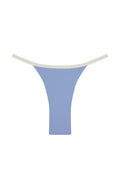 Blue ribbed thong underwear with cream elastic waistband, flat‑lay on white background.