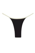 Close-up front view of Kauai Bottom in Black/Ivory showcasing high-cut thong and contrasting ivory waistband on white background