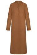 Front view of Kokomo Kaftan in caramel cotton voile with V-slit neckline, single button and long sleeves on white