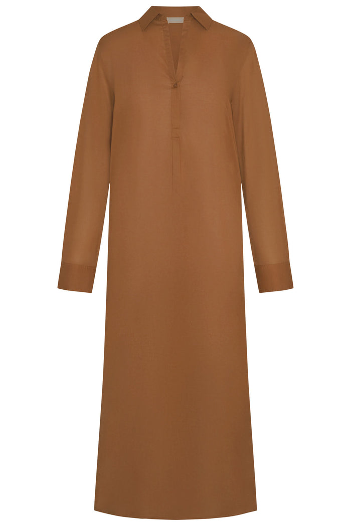 Front view of Kokomo Kaftan in caramel cotton voile with V-slit neckline, single button and long sleeves on white