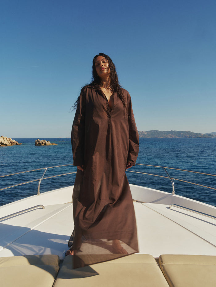 Front view of Kokomo Kaftan in espresso showcasing collared neckline, center-front buttons and semi-sheer voile on a boat