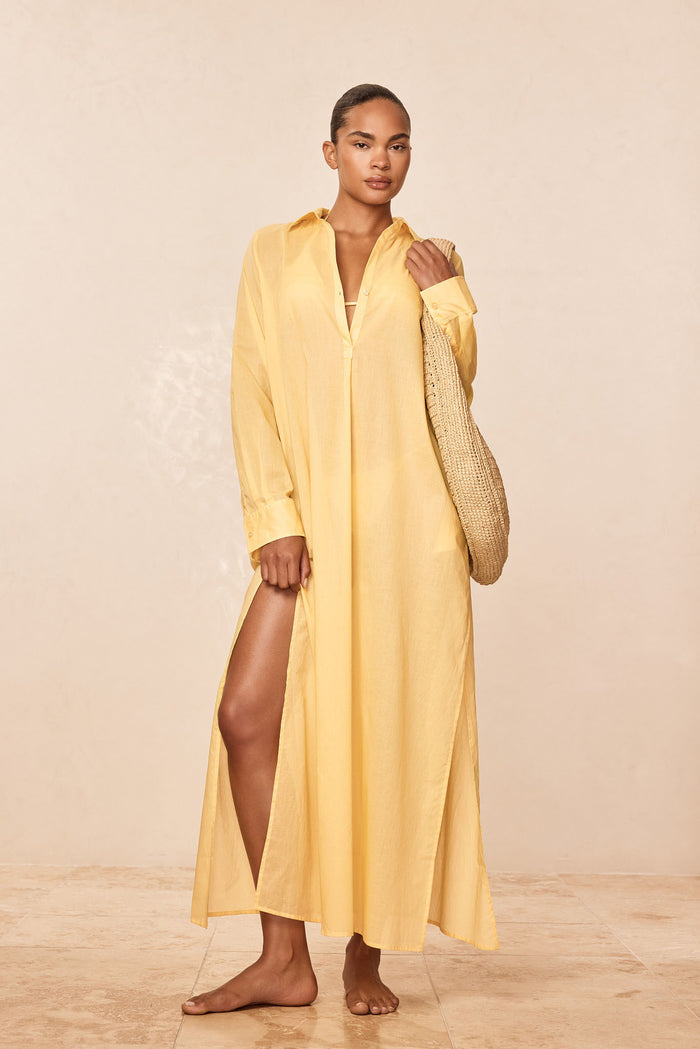 Three-quarter front of Kokomo Kaftan in Meyer voile showing collar, center-front buttons and side slit on neutral background