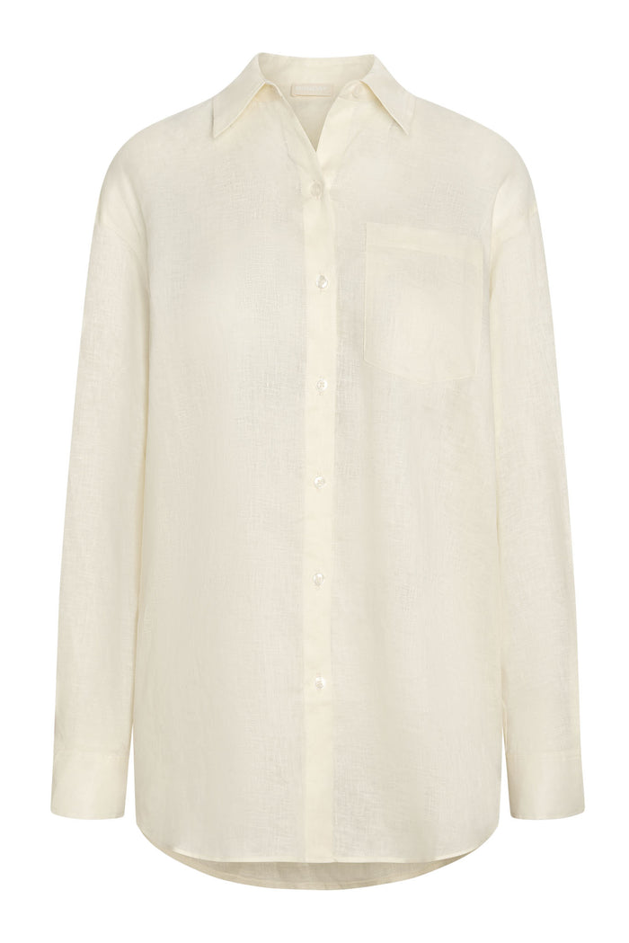 Front view of La Jolla linen shirt in ivory showing button-front, chest pocket, long sleeves and curved hem on white background