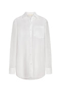 Front view of La Jolla Linen Shirt in white linen showing collar, chest pocket, button front and relaxed oversized fit