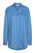 Front view of La Jolla linen shirt in azure showing collar, chest pocket, center-front buttons and long sleeves on white