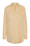 Front view of La Jolla Linen shirt in raffia showing button-front, chest patch pocket and long sleeves on white background