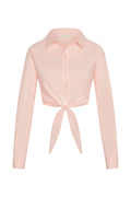 Front view of La Jolla tie shirt in powder pink showing cropped tie-front knot, button placket and sleeves on white