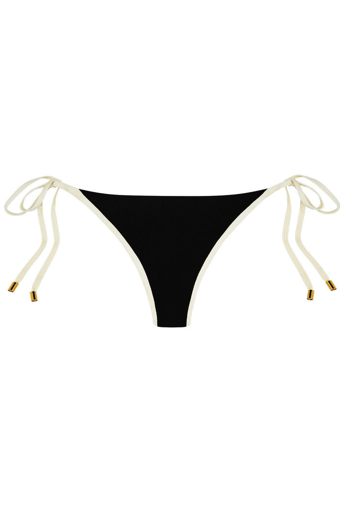 Front view of Le Marais bottom showcasing black fabric, ivory contrast trim and adjustable side ties with gold tips on white background