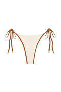Front of Le Marais Bottom in ivory and caramel showing color-block design, adjustable side ties with gold hardware