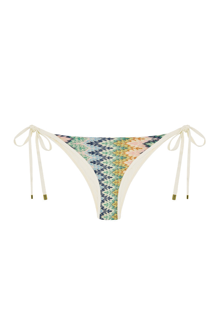 Front view of Le Marais bottom in Porto Cervo Multi showing multicolor zigzag print and cream tie-side straps with gold tips