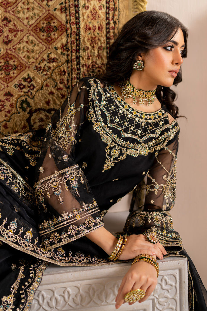 Naqshi leena shirt showing continuous embellished motifs across back with scalloped side seam enhancements.