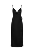 Front view of Levanzo black linen wrap maxi dress with V-neck, thin spaghetti straps and side tie on white background