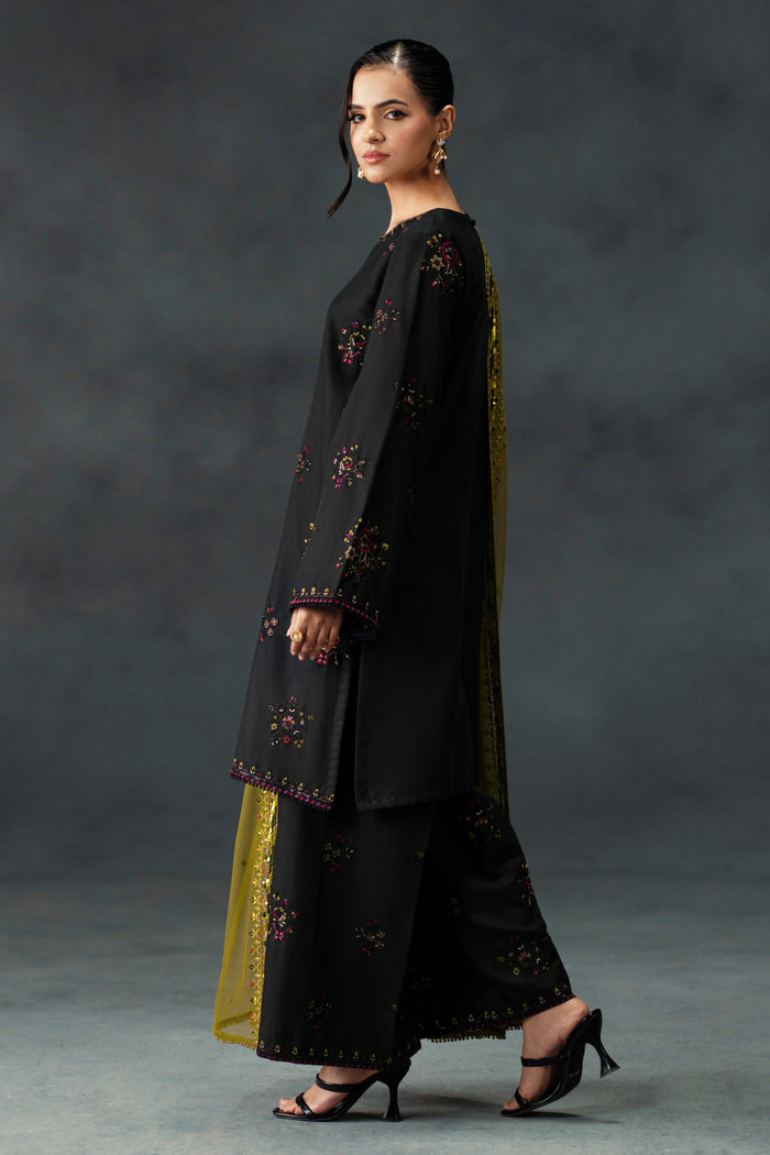 Madiha by NAQSHI angled view showing embroidery on shirt front and contrast olive panels