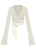 Front view of ivory crochet wrap top showcasing wrap waist tie, bell sleeves, and cropped fit on white background