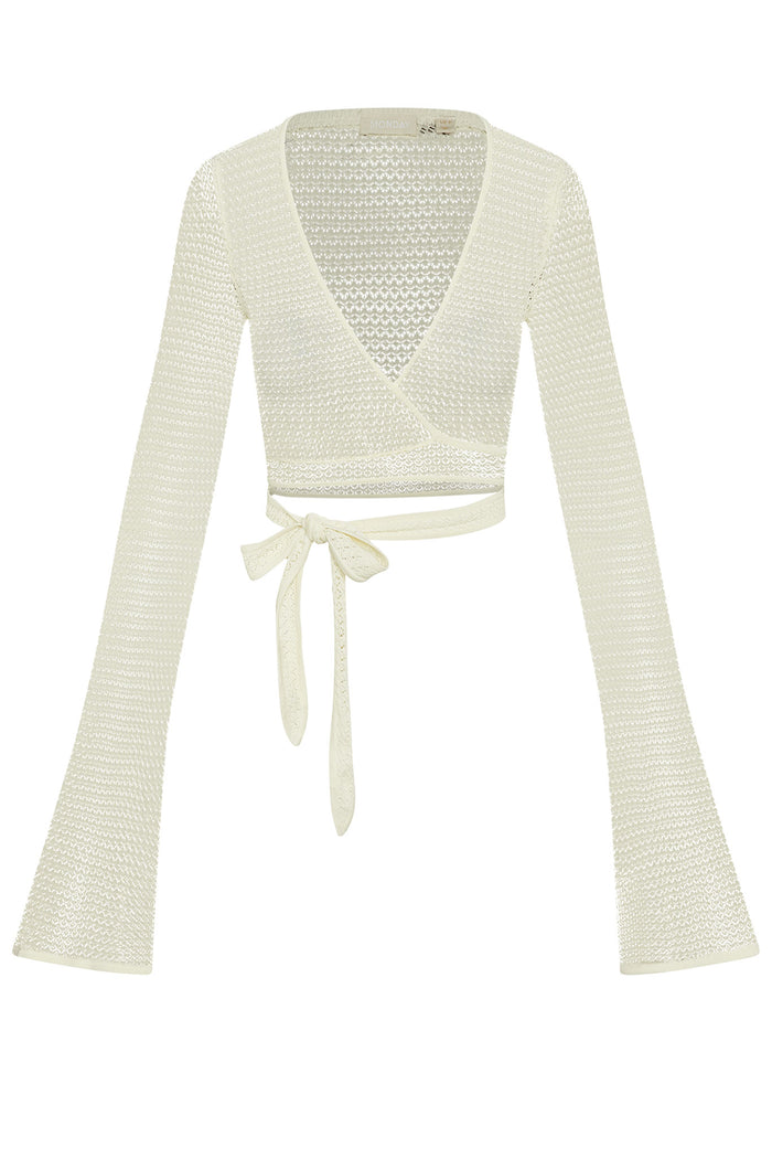 Front view of ivory crochet wrap top showcasing wrap waist tie, bell sleeves, and cropped fit on white background