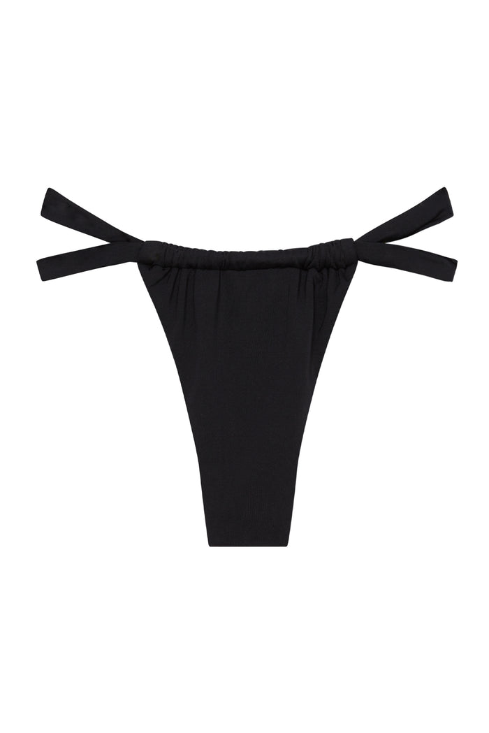 Front view of Malta Bottom in black showcasing high-cut silhouette and adjustable side ties on white background