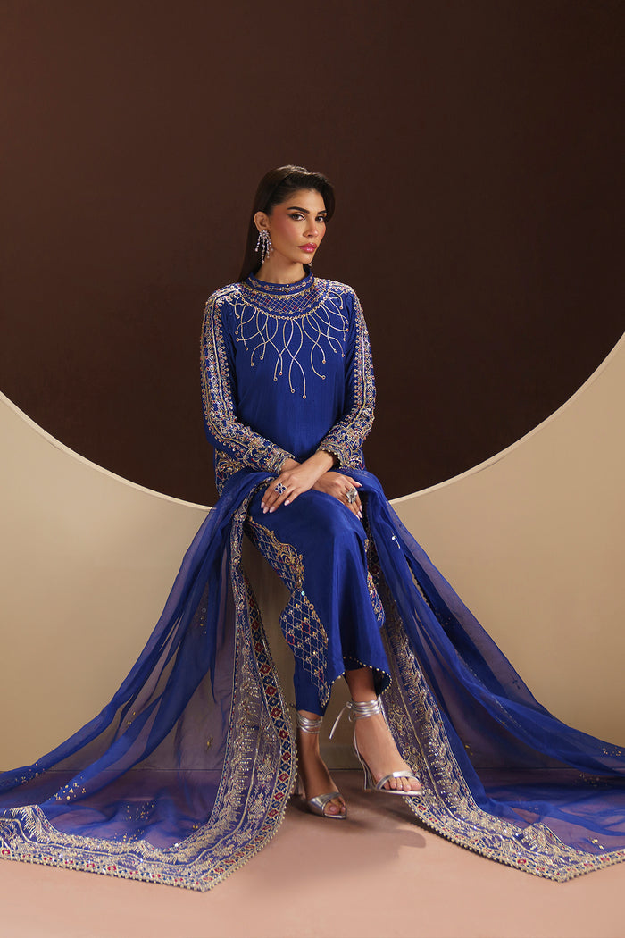 Detailed shot of Naqshi Manvi sleeve cuff featuring motif embroidery, sequin-and-adda work, and scalloped lace edging.